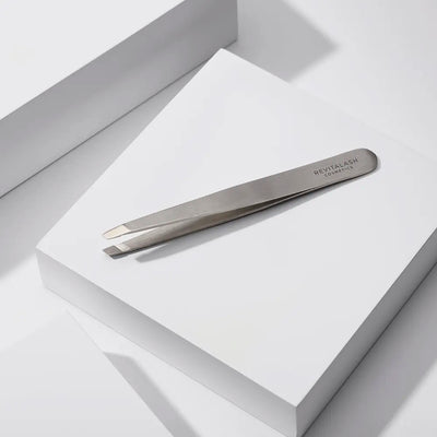 Image of Precision Tweezers laying on a white box