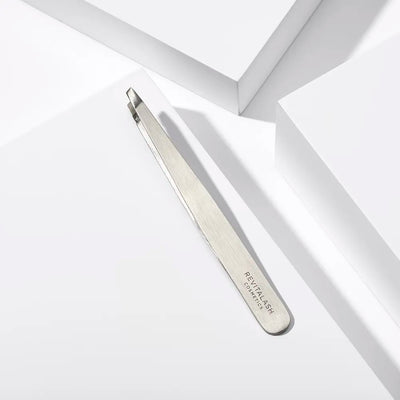 Image of Precision Tweezers laying on a white box